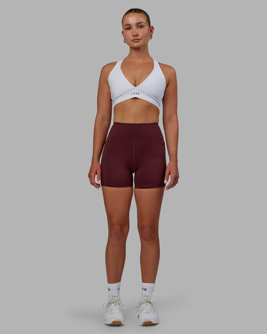 Woman wearing Elite X-Length Shorts - Dark Cherry