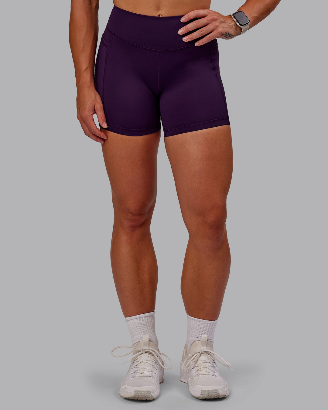 Woman wearing Elite X-Short Legging in Deep Purple | Size:S