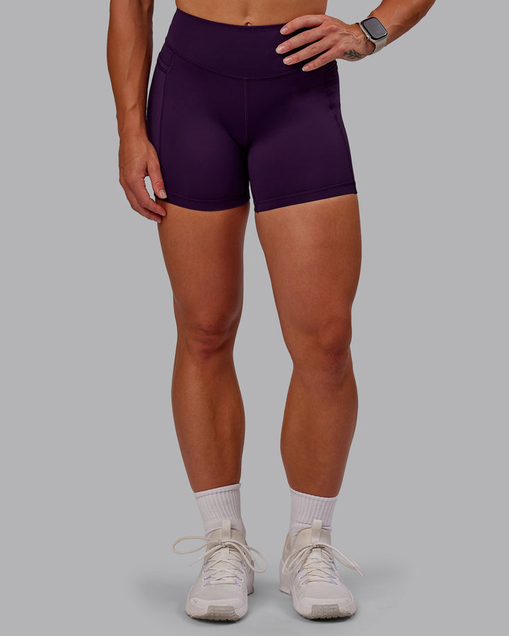 Woman wearing Elite X-Short Legging in Deep Purple | Size:S
