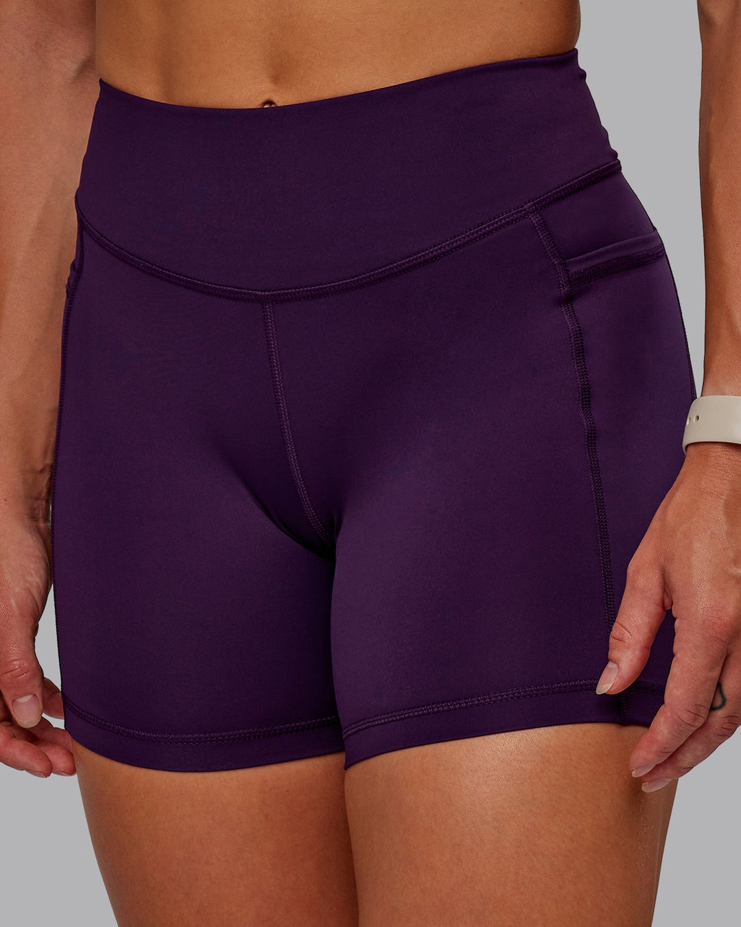 Woman wearing Elite X-Short Legging in Deep Purple | Size:S