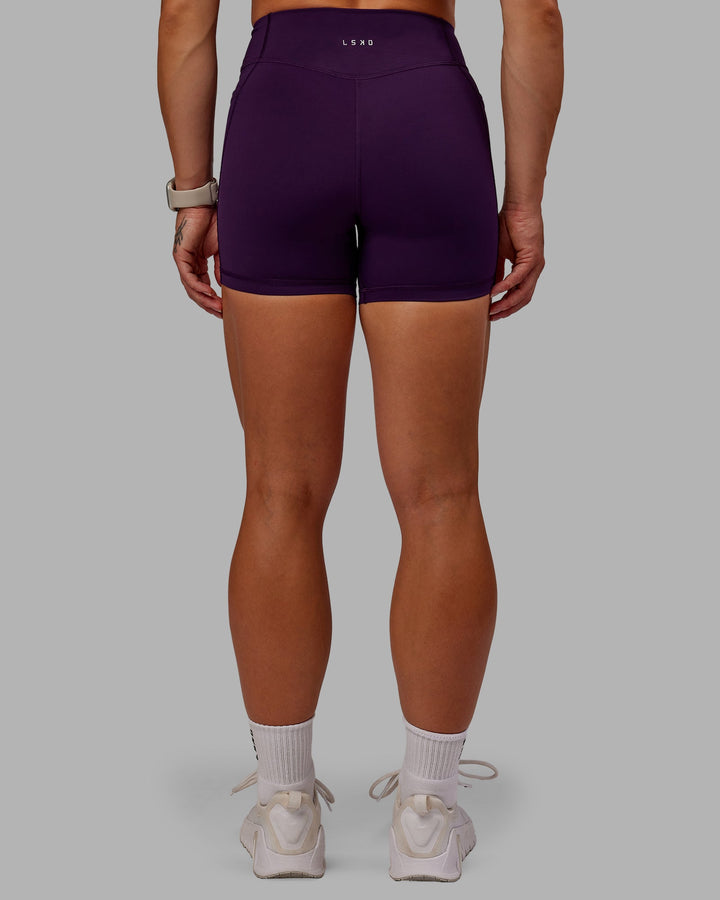 Woman wearing Elite X-Short Legging in Deep Purple | Size:S
