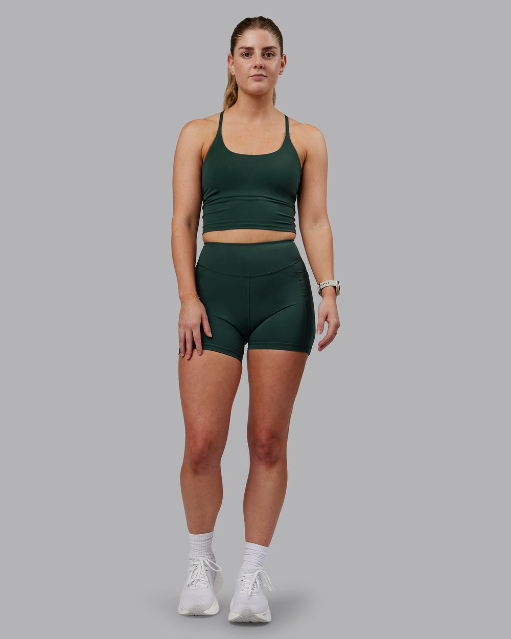 Woman wearing Elite X-Shorts - Vital Green