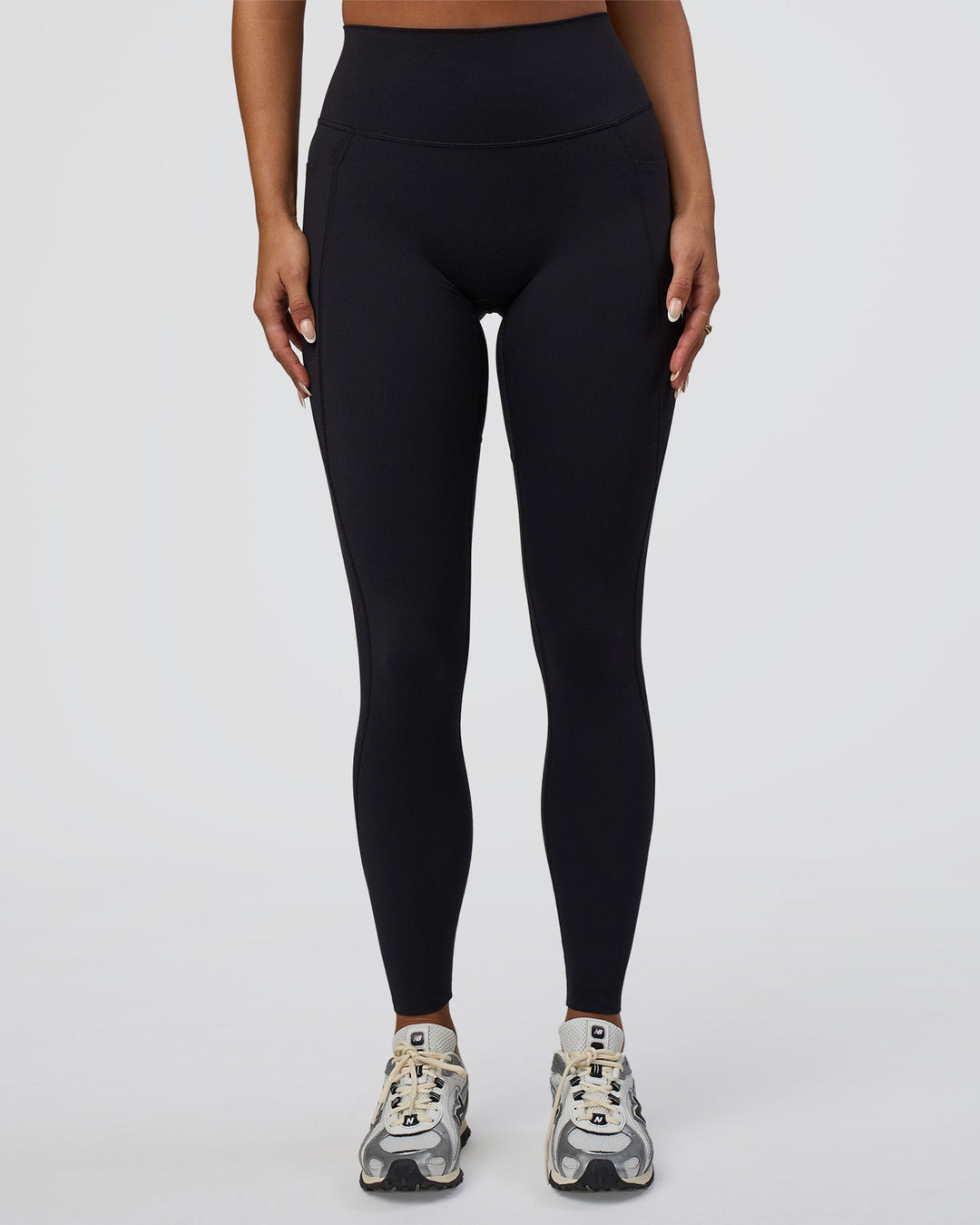 Woman wearing Elixir Defined High-Rise Full Length Legging Pockets - Black | Model:Bianca | Size:S