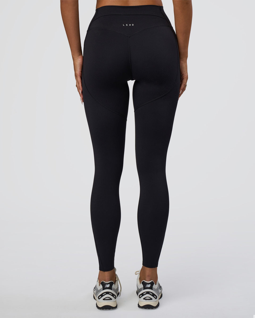 Woman wearing Elixir Defined High-Rise Full Length Legging Pockets - Black | Model:Bianca | Size:S