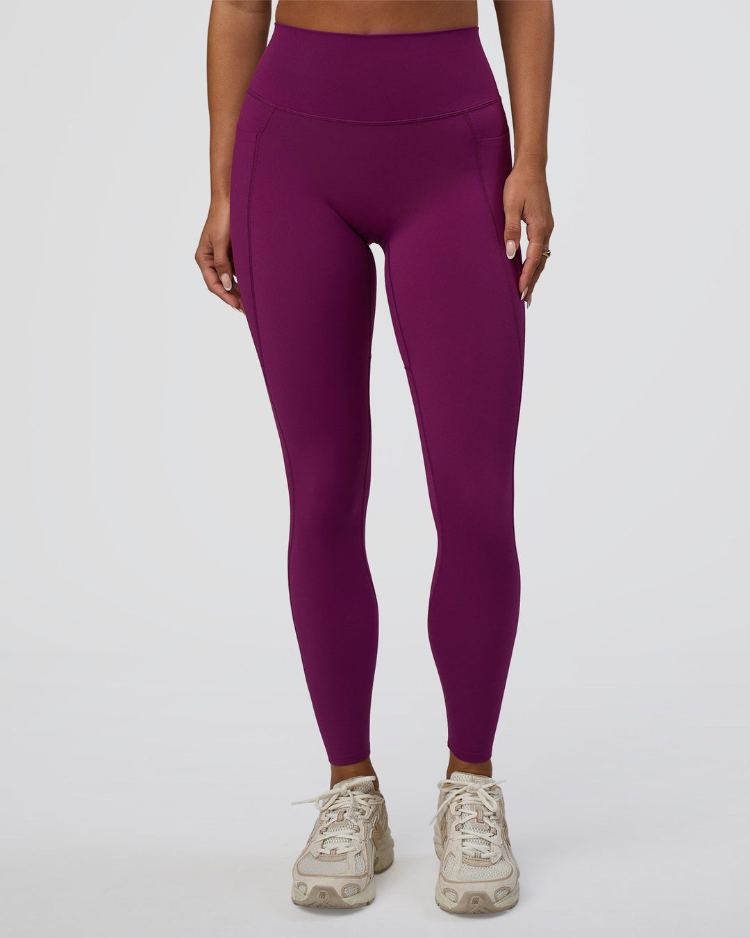 Woman wearing Elixir Defined High-Rise Full Length Legging Pockets - Plum Caspia | Model:Bianca | Size:S