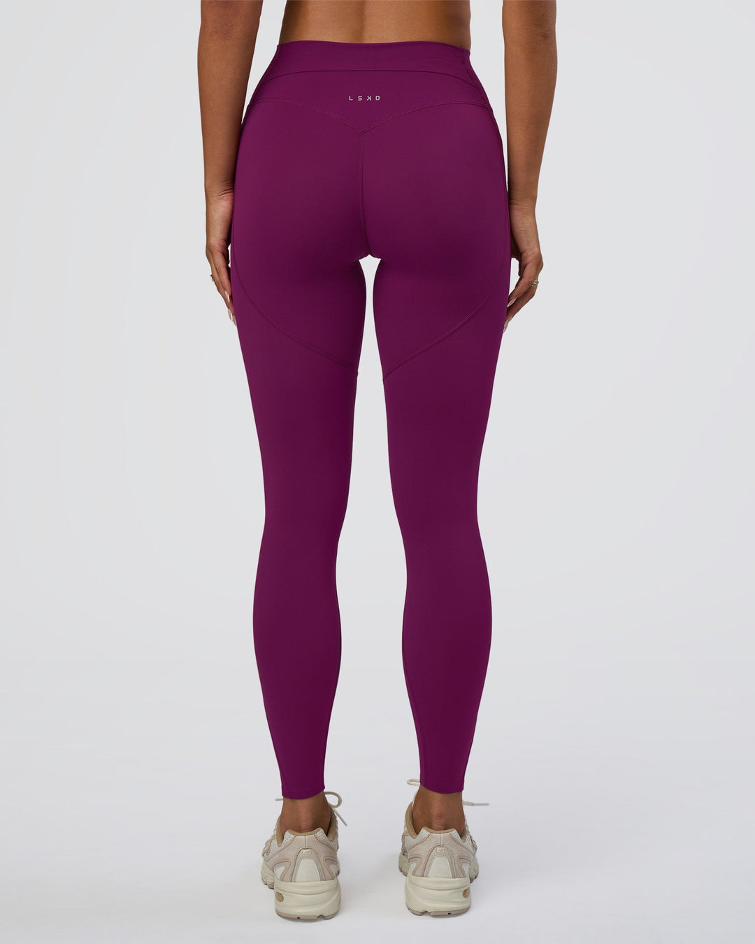 Woman wearing Elixir Defined High-Rise Full Length Legging Pockets - Plum Caspia | Model:Bianca | Size:S