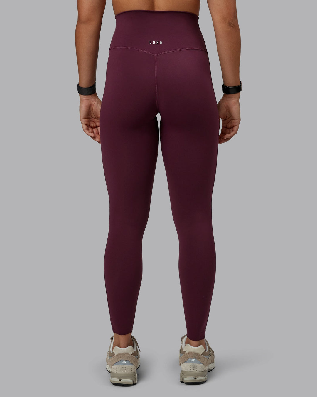 Woman wearing Elixir Full Length Tight in Cherry Lacquer | Size:S