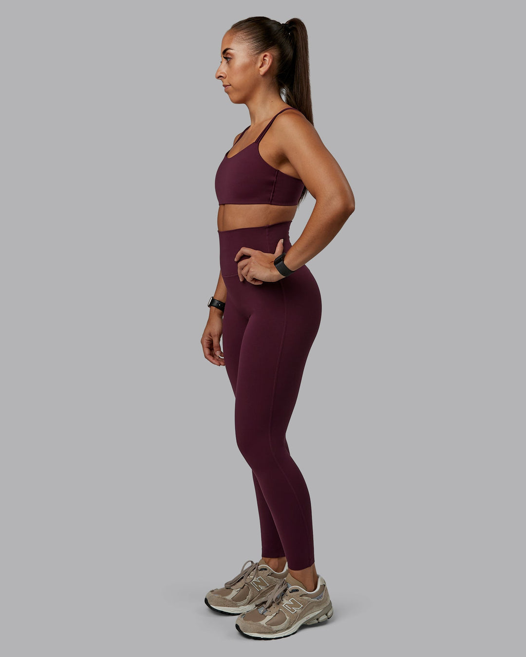 Woman wearing Elixir Full Length Tight in Cherry Lacquer | Size:S