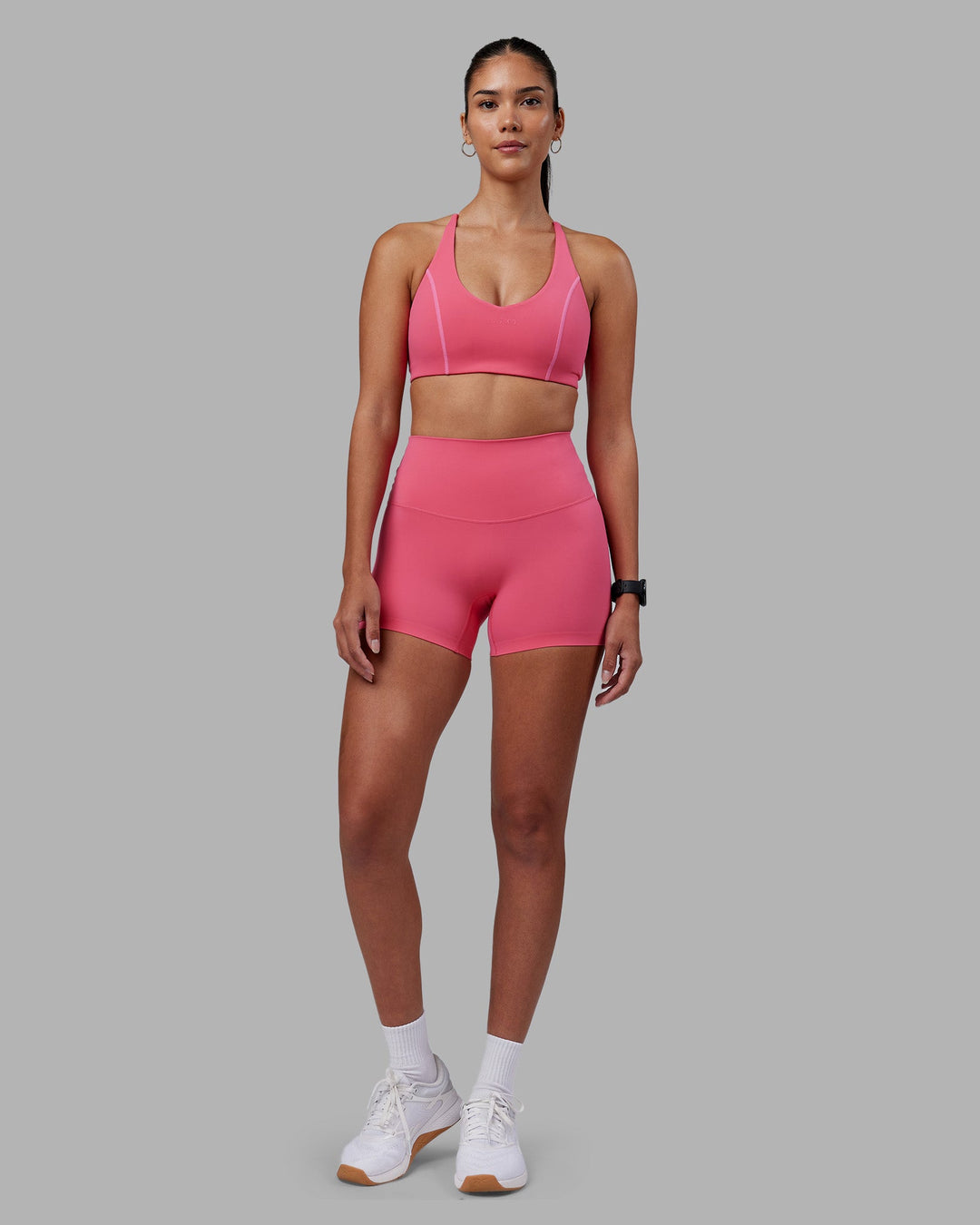 Woman wearing Elixir High-Rise 4&quot; Short - Hot Pink | Model:Rhiley | Size:S