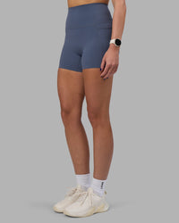 Woman wearing Elixir Ultra High-Rise 4" Short Pockets - Night Shadow | Model:Phoebe | Size:S