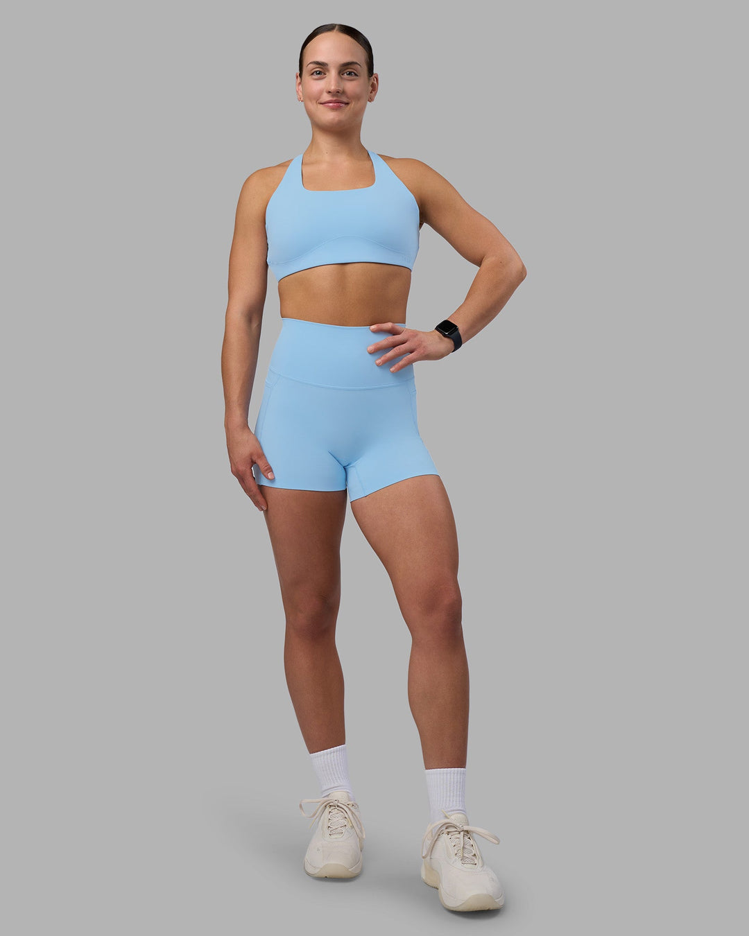 Woman wearing Elixir Ultra High-Rise 4&quot; Short Pockets - Open Air | Model:Keisha | Size:S