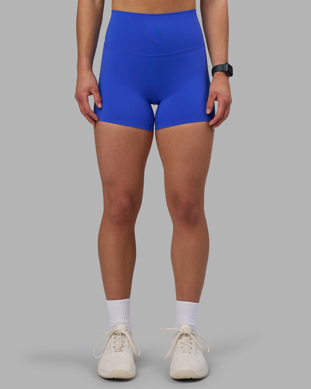 Woman wearing Elixir Ultra High-Rise 4&quot; Short - Power Cobalt | Model:Keisha | Size:S