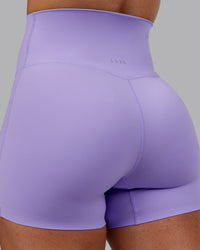 Woman wearing Elixir Ultra High-Rise 4" Short - Violet Ray | Model:Ayla | Size:S