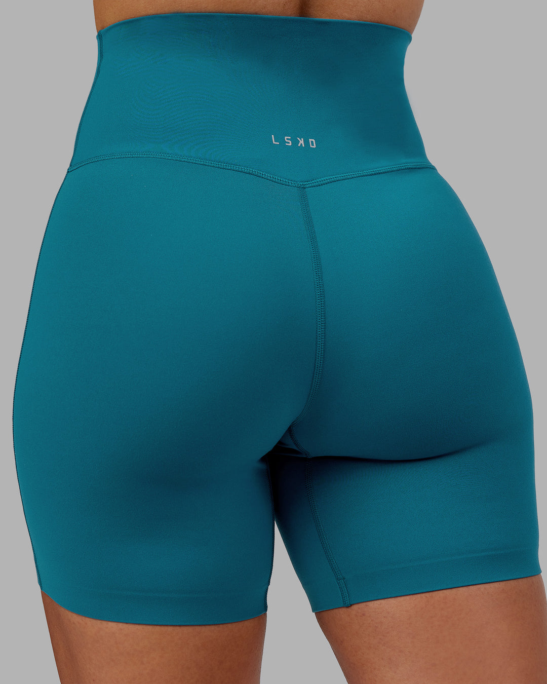 Woman wearing Elixir Ultra High-Rise 6&quot; Short - Blue Coral | Model:Ayla | Size:S