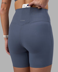 Woman wearing Elixir Ultra High-Rise 6" Short - Night Shadow | Model:Phoebe | Size:S