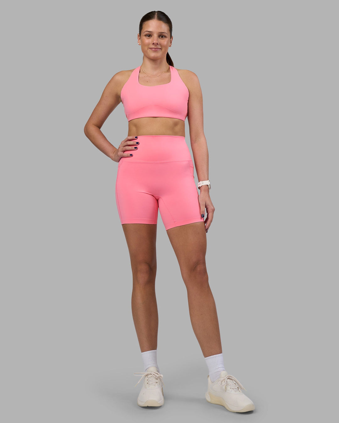 Woman wearing Elixir Ultra High-Rise 6&quot; Short Pockets - Candy Pink | Model:Phoebe | Size:S