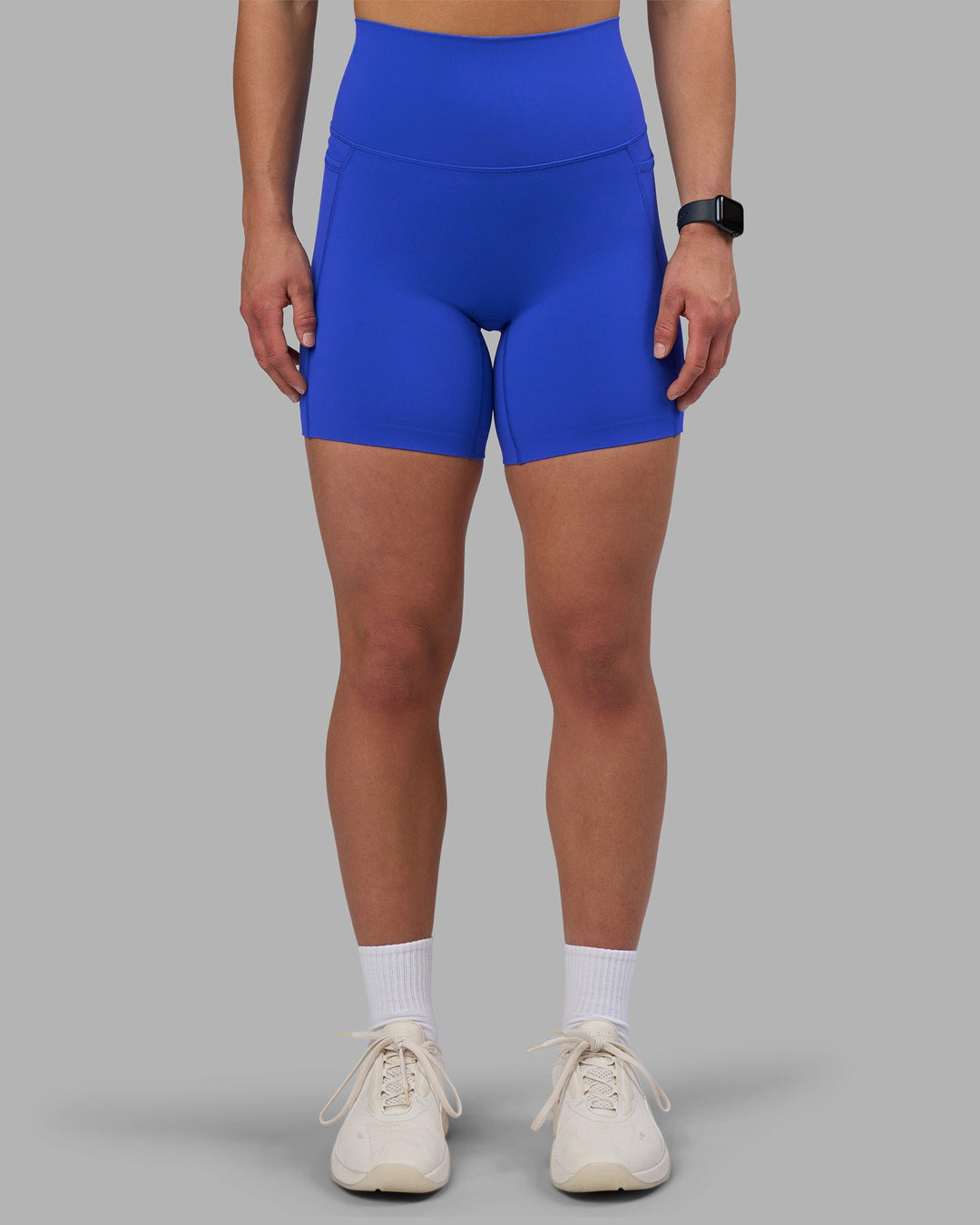 Woman wearing Elixir Ultra High-Rise 6&quot; Short Pockets - Power Cobalt | Model:Keisha | Size:S