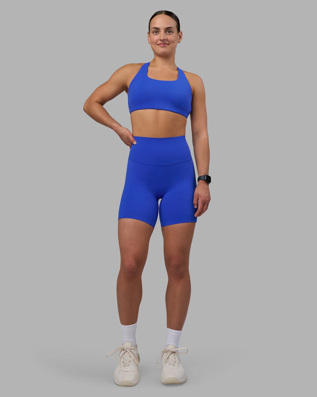 Woman wearing Elixir Ultra High-Rise 6&quot; Short - Power Cobalt | Model:Keisha | Size:S