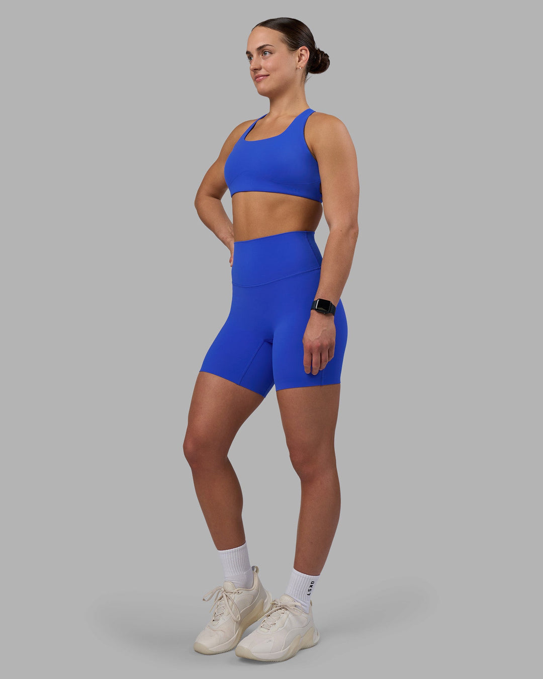 Woman wearing Elixir Ultra High-Rise 6&quot; Short - Power Cobalt | Model:Keisha | Size:S