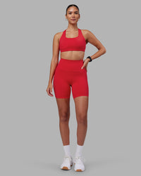 Woman wearing Elixir Ultra High-Rise 6" Short - Scarlet | Model:Rhiley | Size:S