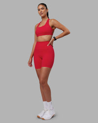 Woman wearing Elixir Ultra High-Rise 6" Short - Scarlet | Model:Rhiley | Size:S
