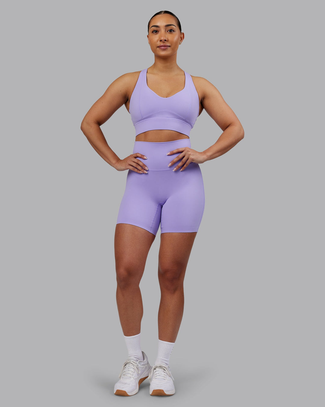 Woman wearing Elixir Ultra High-Rise 6" Short - Violet Ray | Model:Ayla | Size:S
