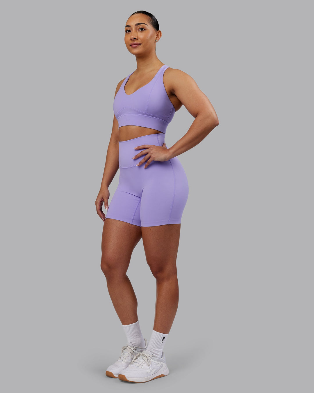Woman wearing Elixir Ultra High-Rise 6&quot; Short - Violet Ray | Model:Ayla | Size:S