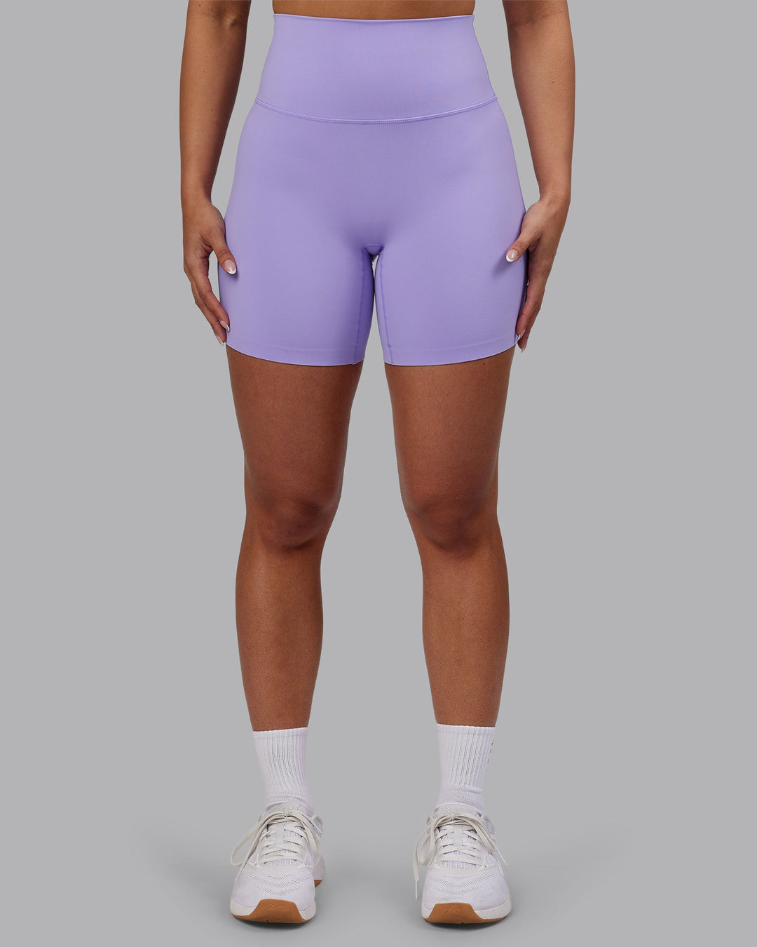 Woman wearing Elixir Ultra High-Rise 6&quot; Short - Violet Ray | Model:Ayla | Size:S