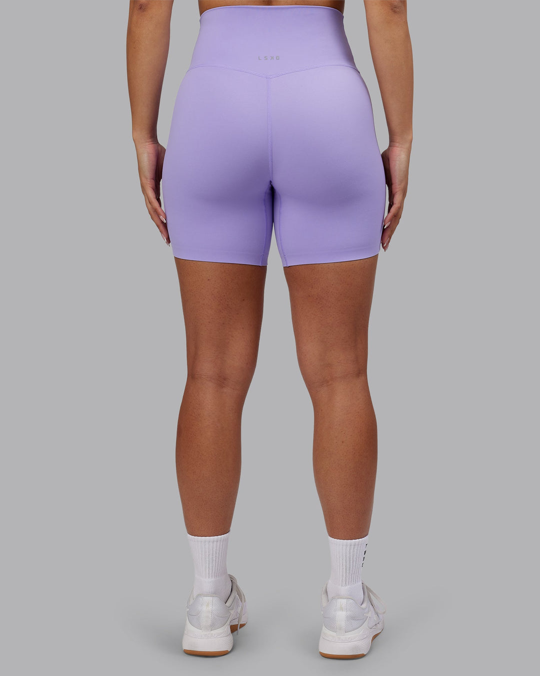 Woman wearing Elixir Ultra High-Rise 6&quot; Short - Violet Ray | Model:Ayla | Size:S