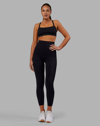 Woman wearing Elixir Ultra High-Rise 7/8 Legging - Black | Model:Kirstyn | Size:S