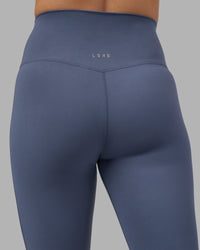 Woman wearing Elixir Ultra High-Rise 7/8 Legging - Night Shadow | Model:Phoebe | Size:S