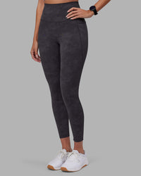 Woman wearing Elixir Ultra High-Rise 7/8 Legging Pockets - Dark Storm Wash | Model:Rhiley | Size:S | Thumbnail Index: 5