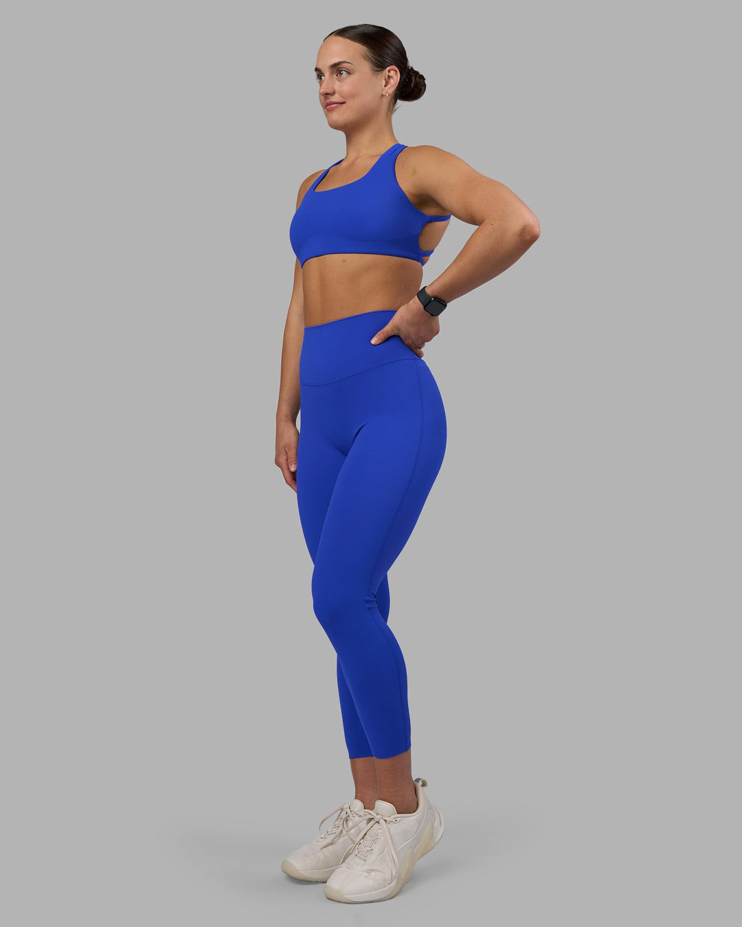 Woman wearing Elixir Ultra High-Rise 7/8 Legging - Power Cobalt | Model:Keisha | Size:S
