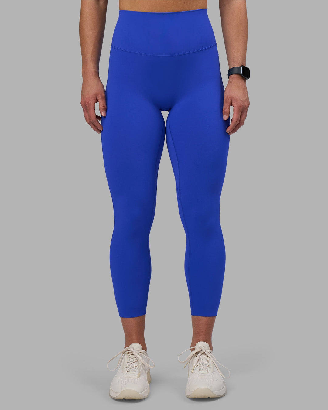 Woman wearing Elixir Ultra High-Rise 7/8 Legging - Power Cobalt | Model:Keisha | Size:S