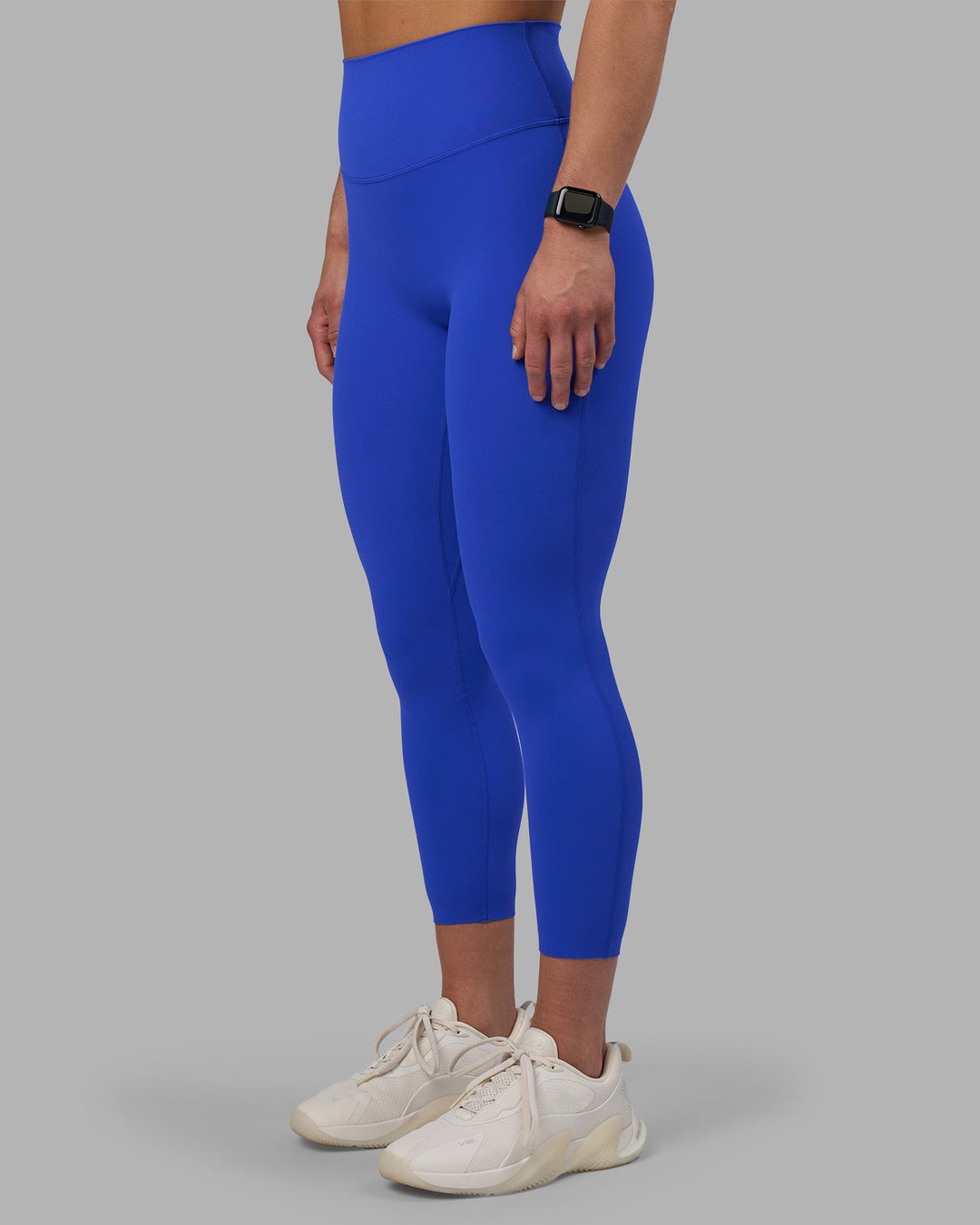 Woman wearing Elixir Ultra High-Rise 7/8 Legging - Power Cobalt | Model:Keisha | Size:S