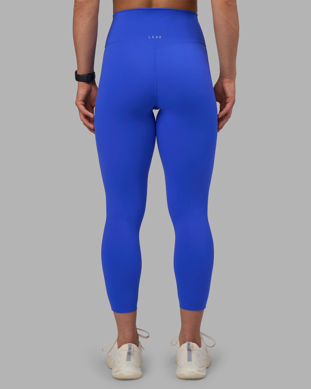 Woman wearing Elixir Ultra High-Rise 7/8 Legging - Power Cobalt | Model:Keisha | Size:S