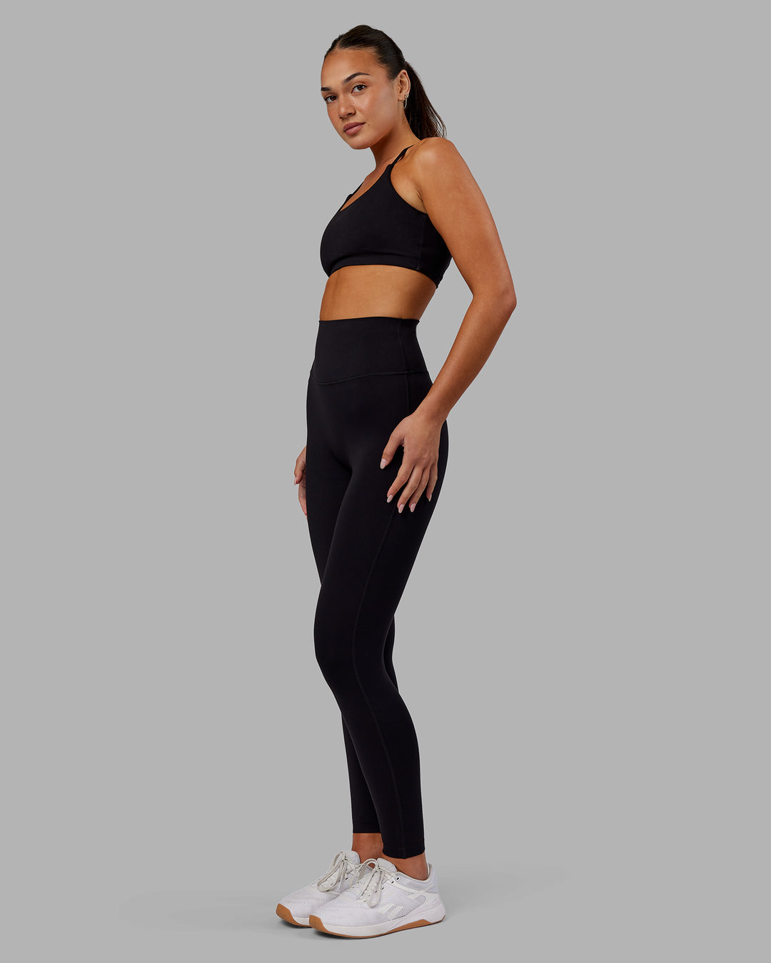 Woman wearing Elixir Ultra High-Rise Full Length Legging - Black | Model:Kirstyn | Size:S