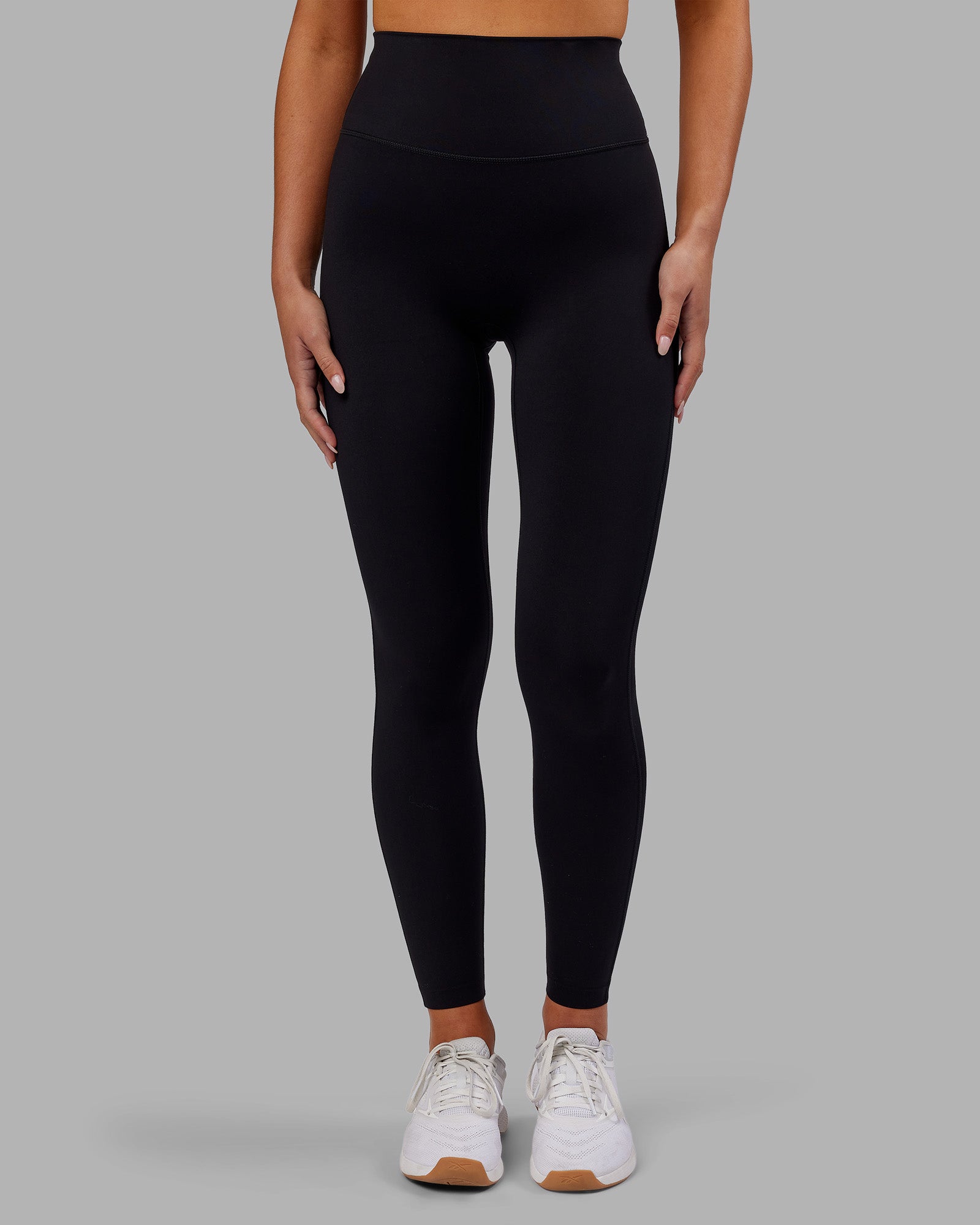 Woman wearing Elixir Ultra High-Rise Full Length Legging - Black | Model:Kirstyn | Size:S