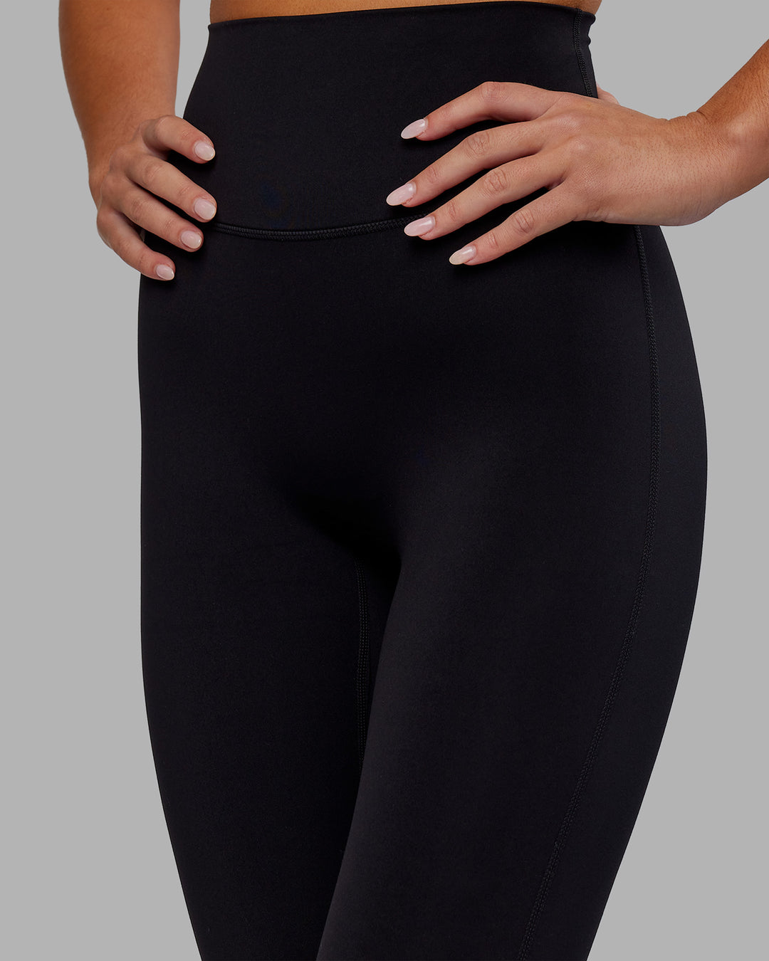 Woman wearing Elixir Ultra High-Rise Full Length Legging - Black | Model:Kirstyn | Size:S