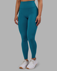 Woman wearing Elixir Ultra High-Rise Full Length Legging - Blue Coral | Model:Ayla | Size:S | Thumbnail Index: 1