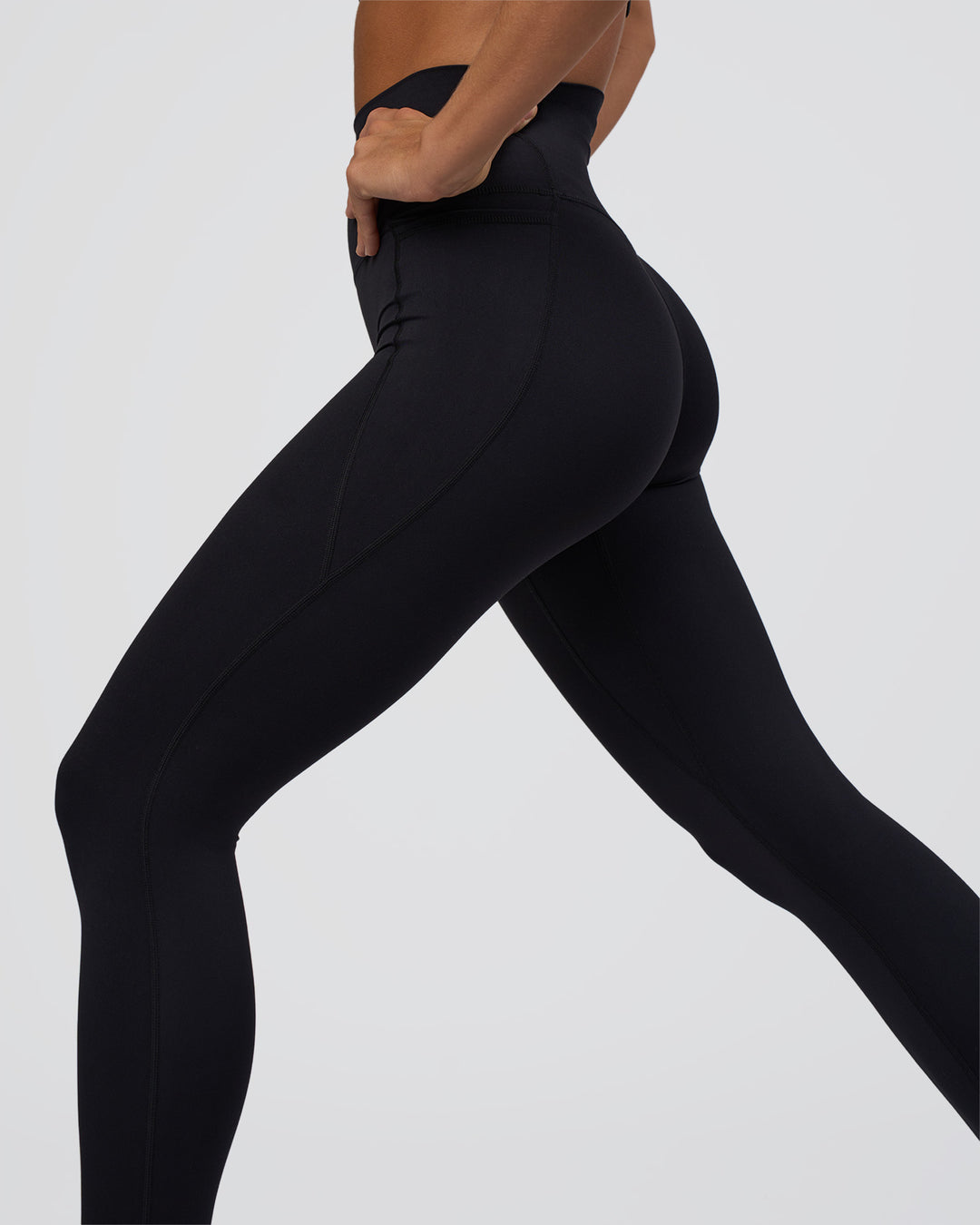 Woman wearing Elixir Ultra High-Rise Full Length Legging Pockets - Black | Model:Amity | Size:S