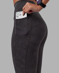 Woman wearing Elixir Ultra High-Rise Full Length Legging Pockets - Dark Storm Wash | Model:Rhiley | Size:S | Thumbnail Index: 4