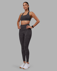 Woman wearing Elixir Ultra High-Rise Full Length Legging Pockets - Dark Storm Wash | Model:Rhiley | Size:S | Thumbnail Index: 0