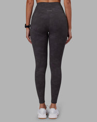 Woman wearing Elixir Ultra High-Rise Full Length Legging Pockets - Dark Storm Wash | Model:Rhiley | Size:S | Thumbnail Index: 3