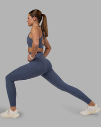 Woman wearing Elixir Ultra High-Rise Full Length Legging Pockets - Night Shadow | Model:Phoebe | Size:S