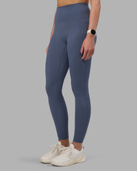 Woman wearing Elixir Ultra High-Rise Full Length Legging Pockets - Night Shadow | Model:Phoebe | Size:S