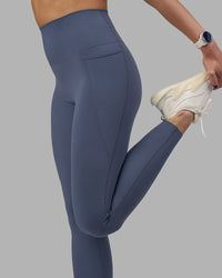 Woman wearing Elixir Ultra High-Rise Full Length Legging Pockets - Night Shadow | Model:Phoebe | Size:S