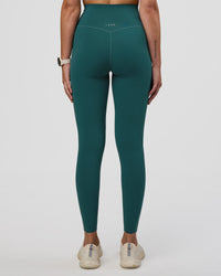 Woman wearing Elixir Ultra High-Rise Full Length Legging Pockets - Transformative Teal | Model:Myrte | Size:S
