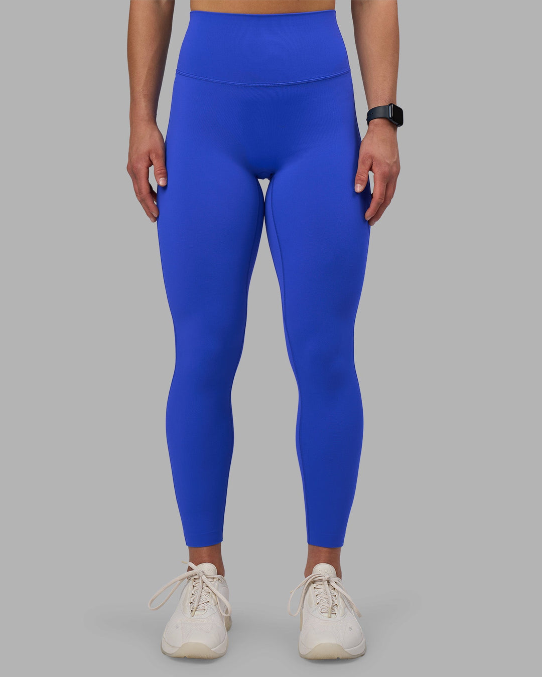 Woman wearing Elixir Ultra High-Rise Full Length Legging - Power Cobalt | Model:Keisha | Size:S
