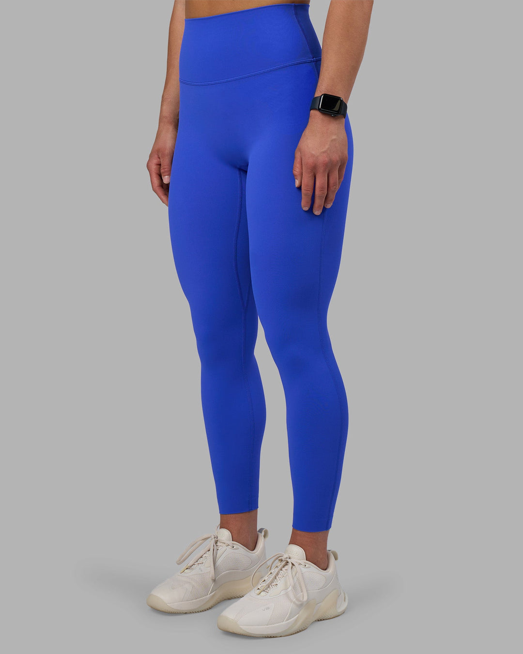 Woman wearing Elixir Ultra High-Rise Full Length Legging - Power Cobalt | Model:Keisha | Size:S